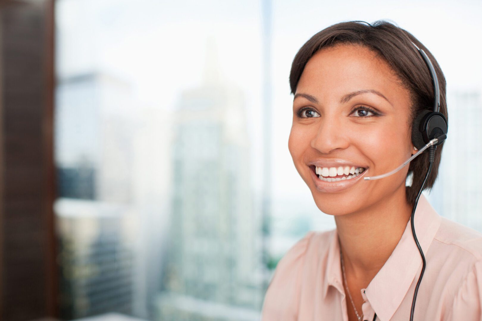 Smiling businesswoman in headset