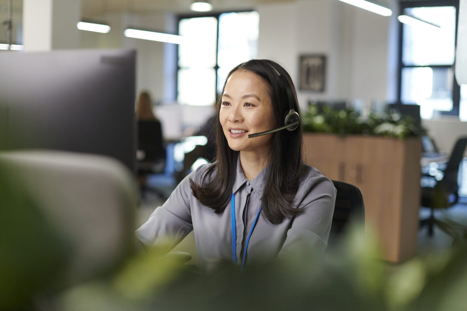 Happy call handler helping a customer