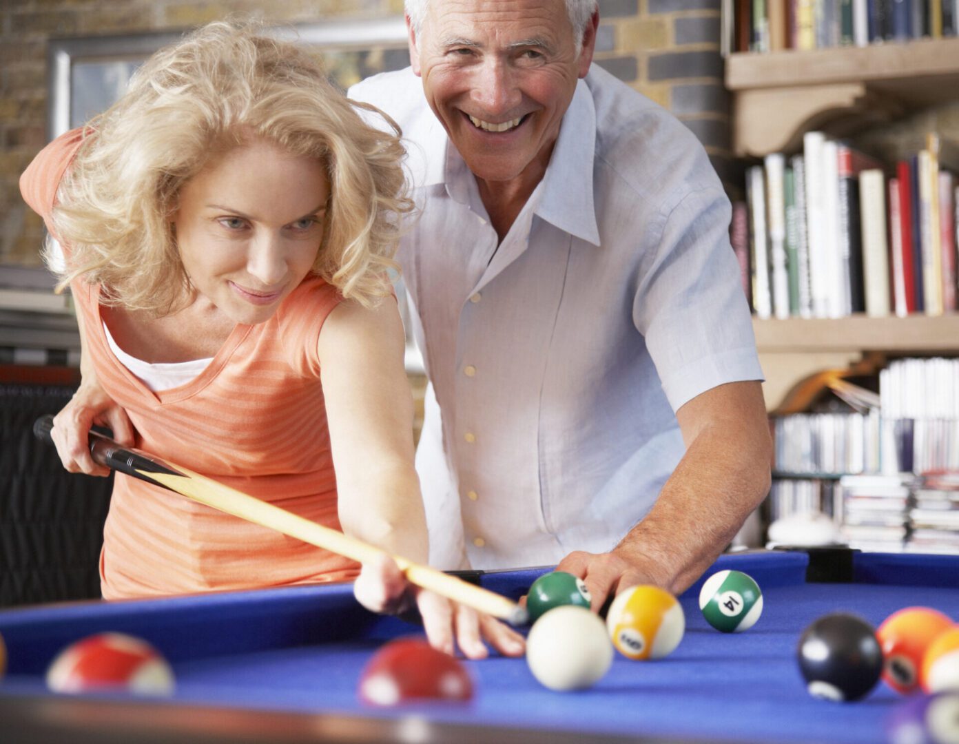 Couple playing pool